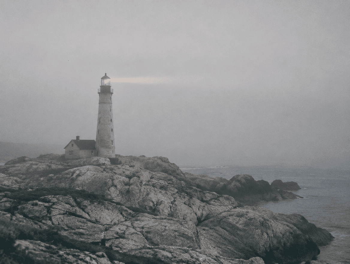 A lighthouse in morning mist